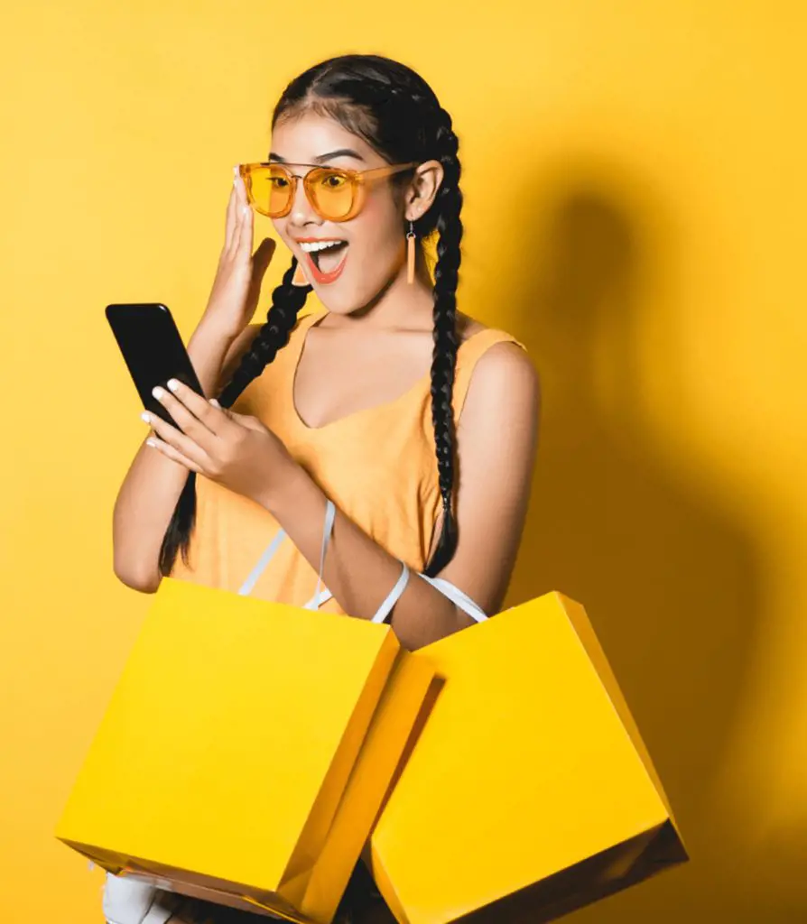 Gen Zer using her smartphone for online shopping